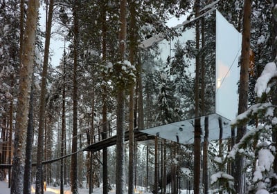 Awe Inspiring views of a tree hotel surrounded by the beautiful landscape of Sweden